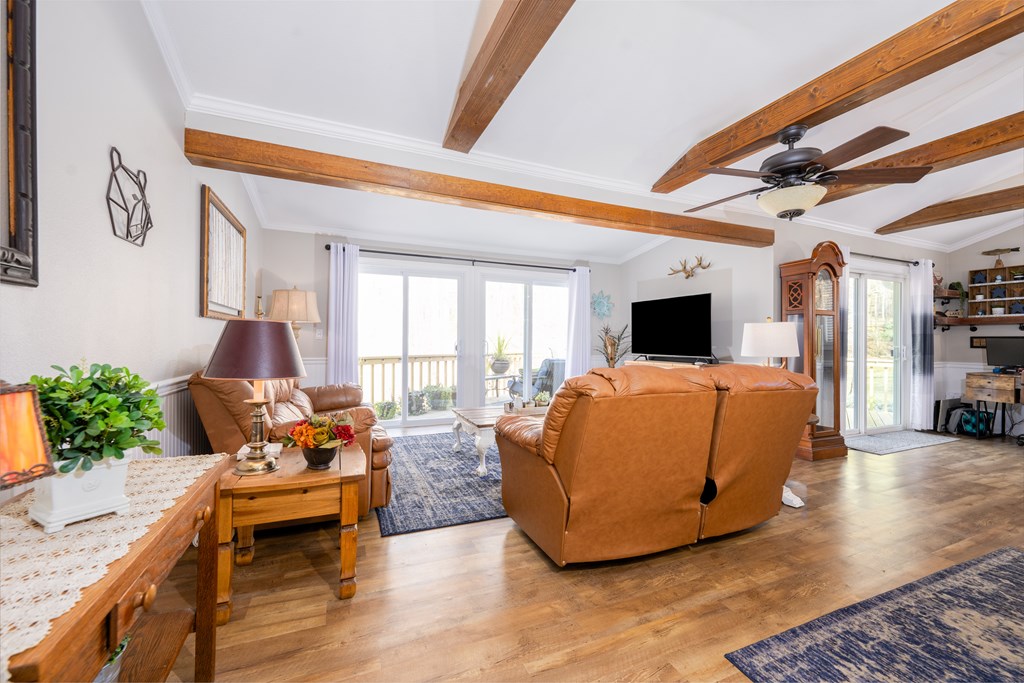 3301 Ellington Road Hayesville, NC 28904 - Photo 8 of 31 a living room with furniture and a flat screen tv