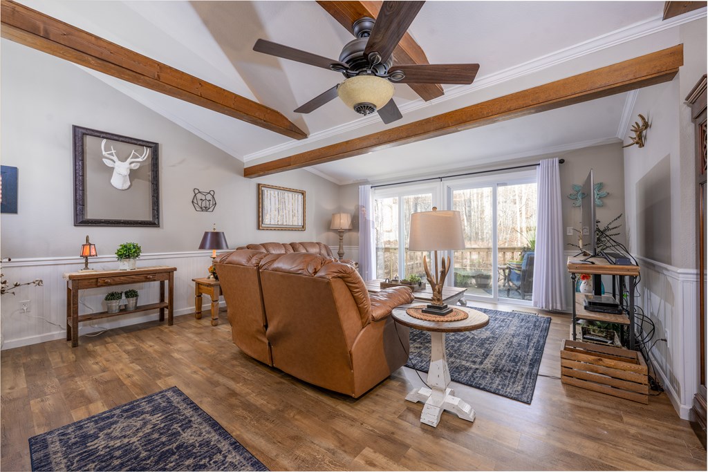 3301 Ellington Road Hayesville, NC 28904 - Photo 9 of 31 a living room with furniture a window and a flat screen tv