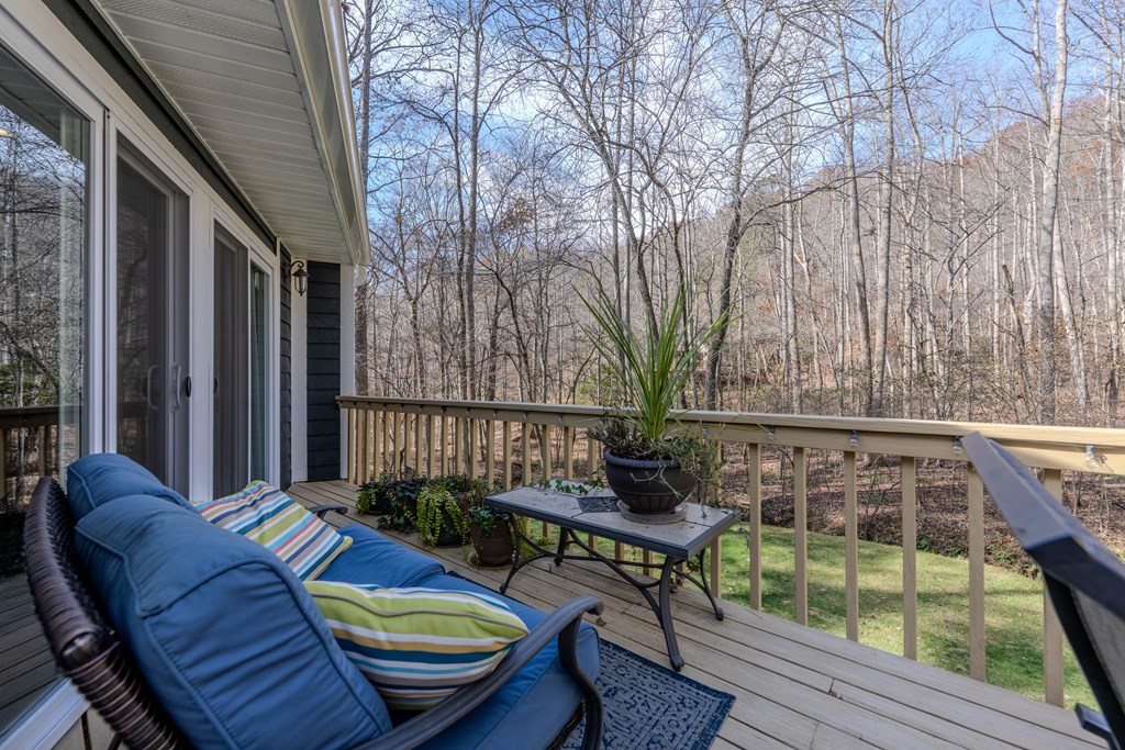 3301 Ellington Road Hayesville, NC 28904 - Photo 10 of 31 a backyard of a house with outdoor seating
