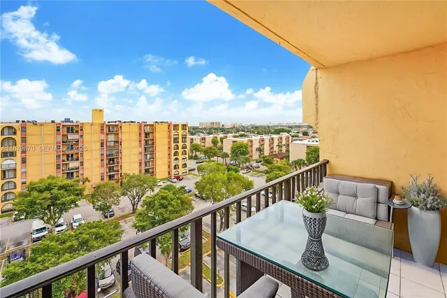 a view of balcony with furniture