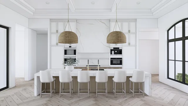 a kitchen with a dining table chairs and white cabinets