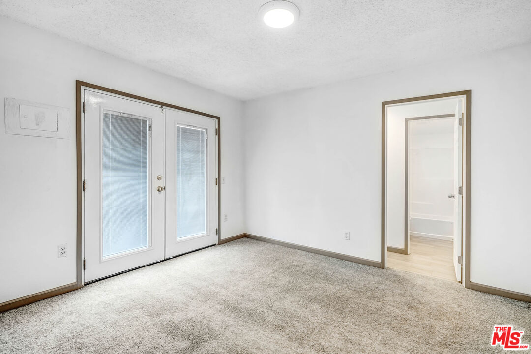 5351 Odell Street Riverside, CA 92509 - Photo 5 of 10 an empty room with closet area