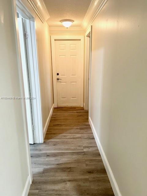 16110 Southwest 6th Street Pembroke Pines, FL 33027 - Photo 21 of 92 a view of a hallway with wooden floor and staircase