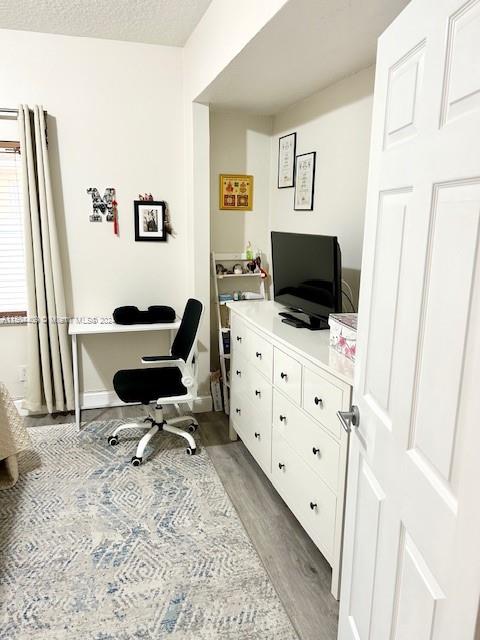 16110 Southwest 6th Street Pembroke Pines, FL 33027 - Photo 22 of 92 a view of a workspace with furniture and a window