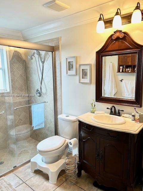 16110 Southwest 6th Street Pembroke Pines, FL 33027 - Photo 26 of 92 a bathroom with a toilet a sink and mirror