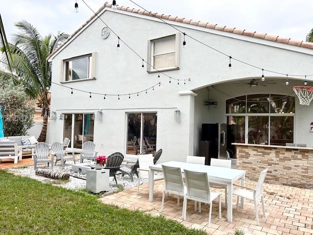 16110 Southwest 6th Street Pembroke Pines, FL 33027 - Photo 54 of 92 a view of a patio with table and chairs