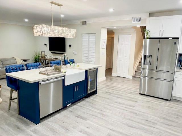 16110 Southwest 6th Street Pembroke Pines, FL 33027 - Photo 64 of 92 a kitchen with a sink stainless steel appliances and cabinets