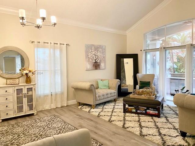 16110 Southwest 6th Street Pembroke Pines, FL 33027 - Photo 65 of 92 a living room with furniture a rug and a window