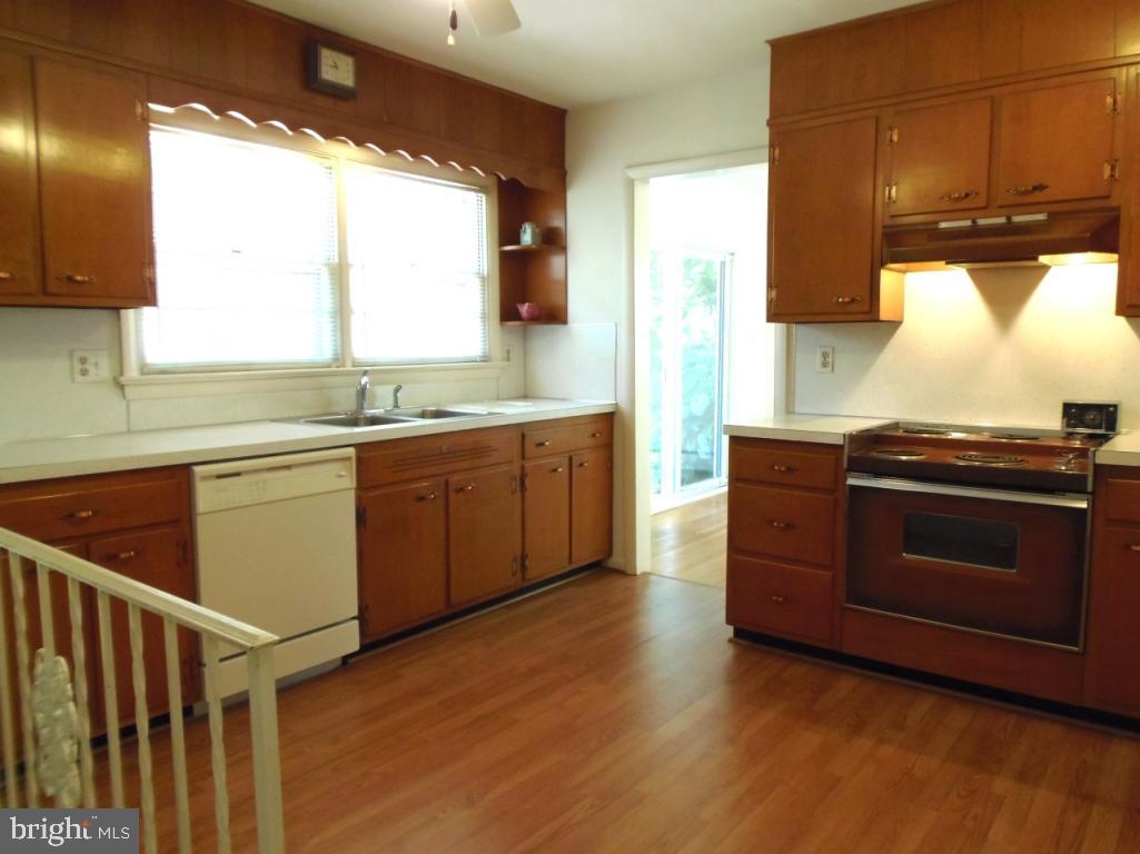 1714 Sammar Road Lancaster, PA 17601 - Photo 14 of 35 a kitchen with stainless steel appliances granite countertop a stove a sink and a microwave