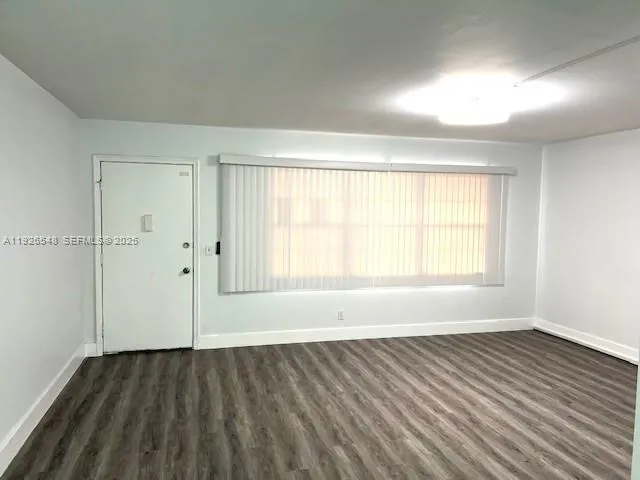 a view of yard with swimming pool and green space