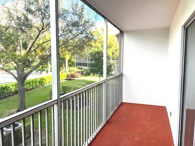 an aerial view of a house with a lake view