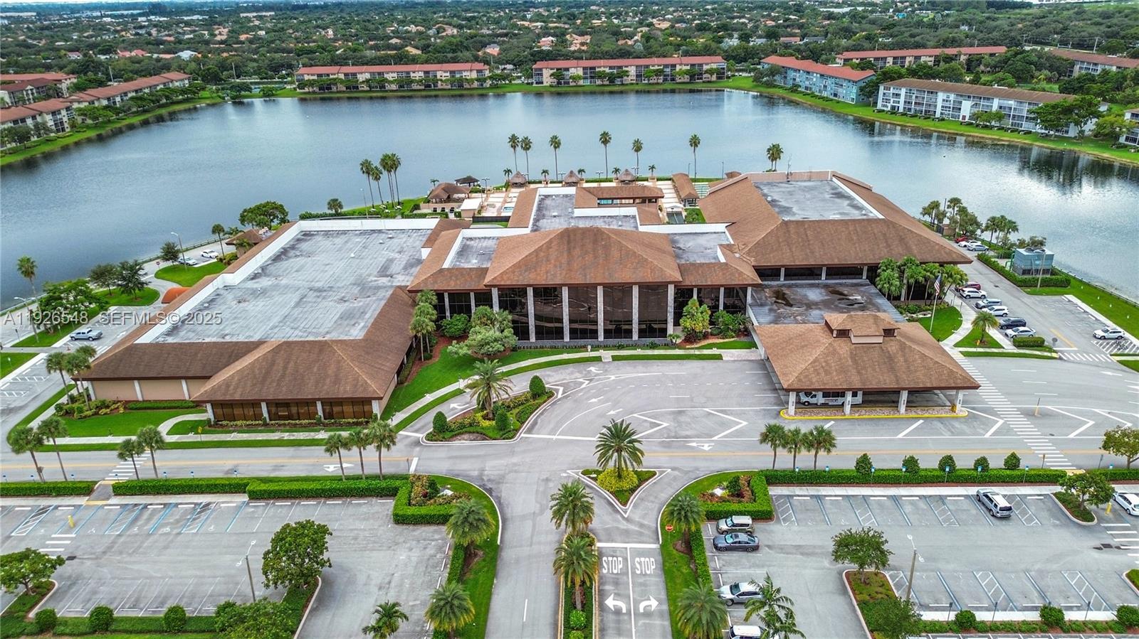 13455 Southwest 9th Court, Unit 216J Pembroke Pines, FL 33027 - Photo 33 of 66 an aerial view of a house with a lake view