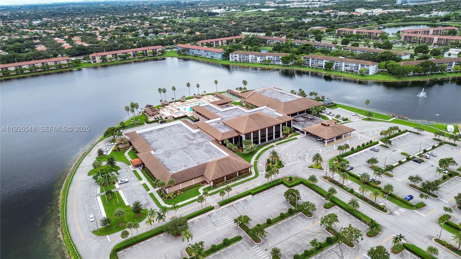 13455 Southwest 9th Court, Unit 216J Pembroke Pines, FL 33027 - Photo 34 of 66 an aerial view of a house with a lake view