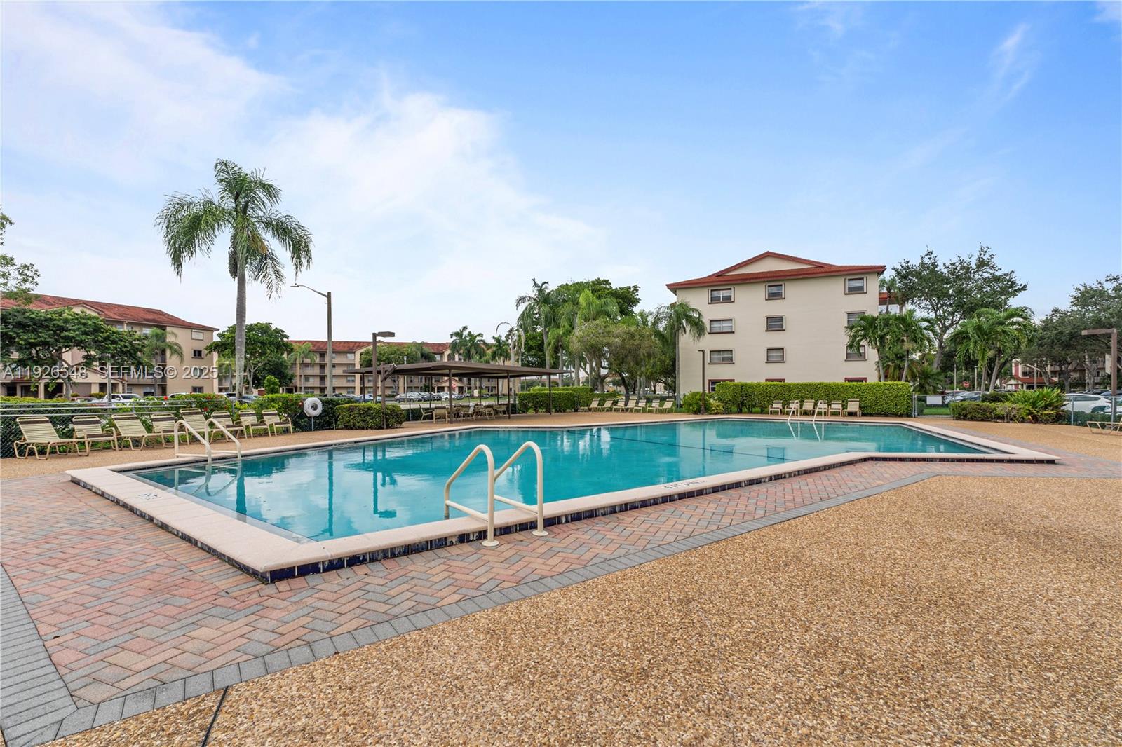 13455 Southwest 9th Court, Unit 216J Pembroke Pines, FL 33027 - Photo 38 of 66 a view of swimming pool with a terrace