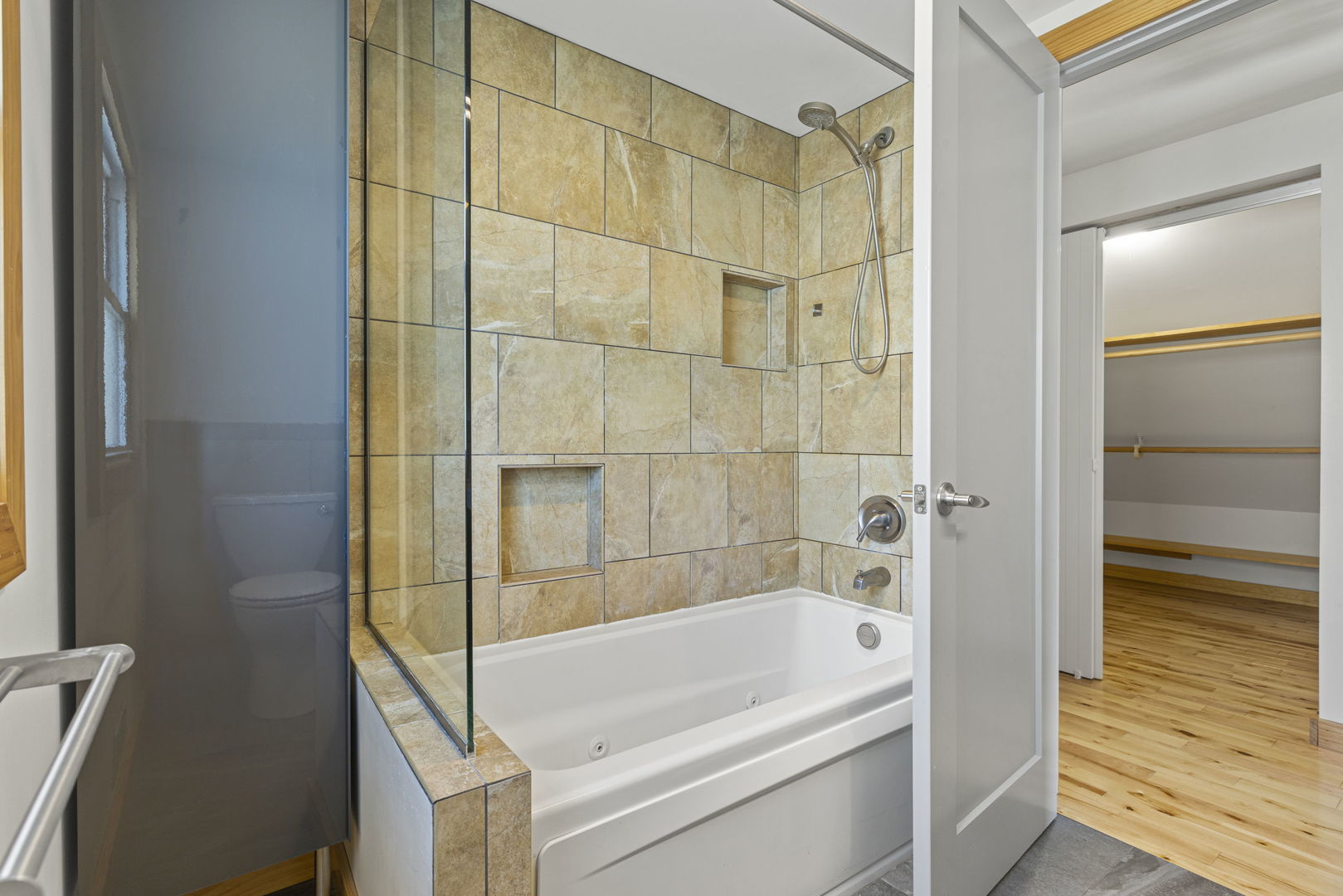 4236 North Ozark Avenue Norridge, IL 60706 - Photo 12 of 17 a bathroom with a bathtub and a shower