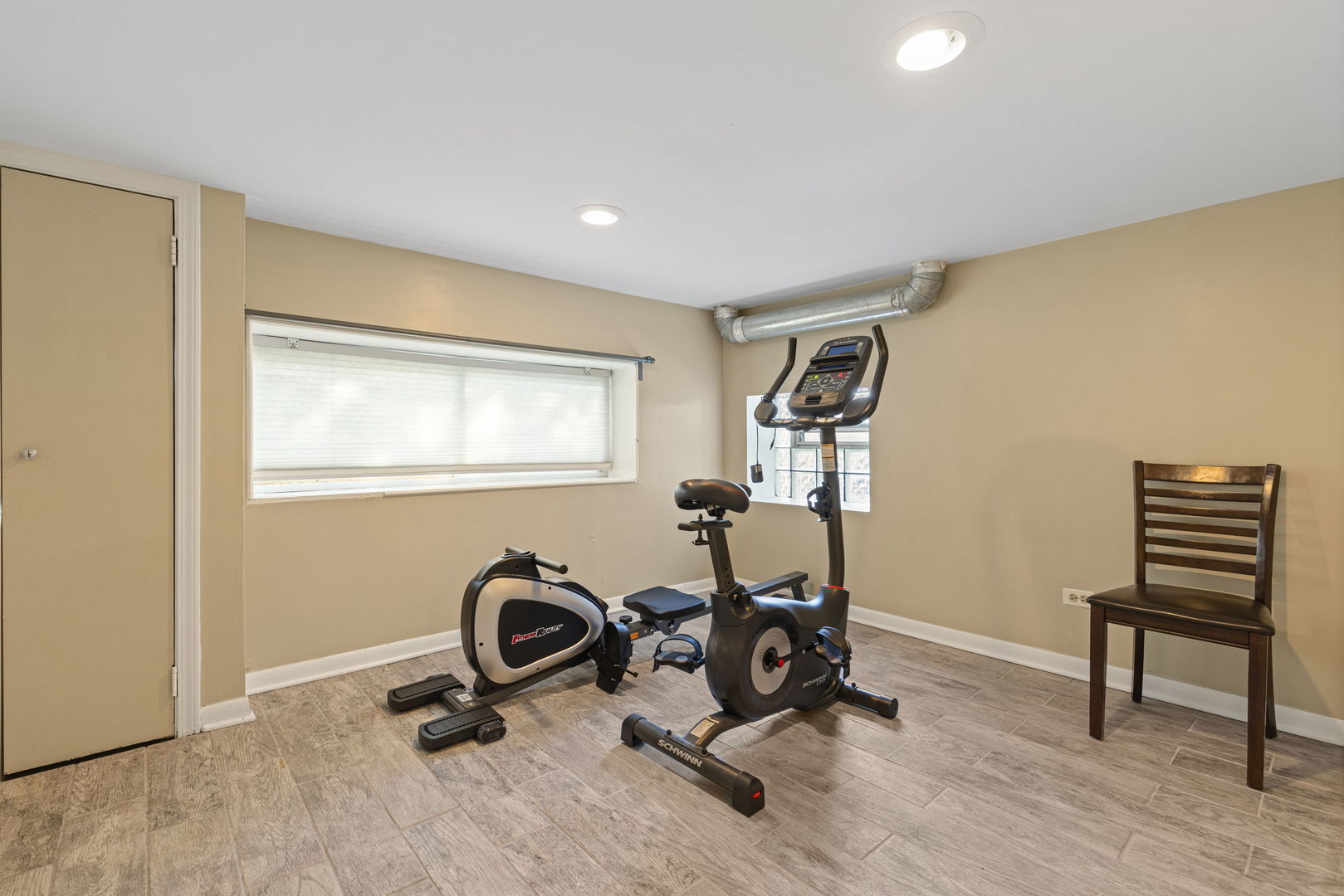 4236 North Ozark Avenue Norridge, IL 60706 - Photo 15 of 17 a view of a workspace with furniture and a window