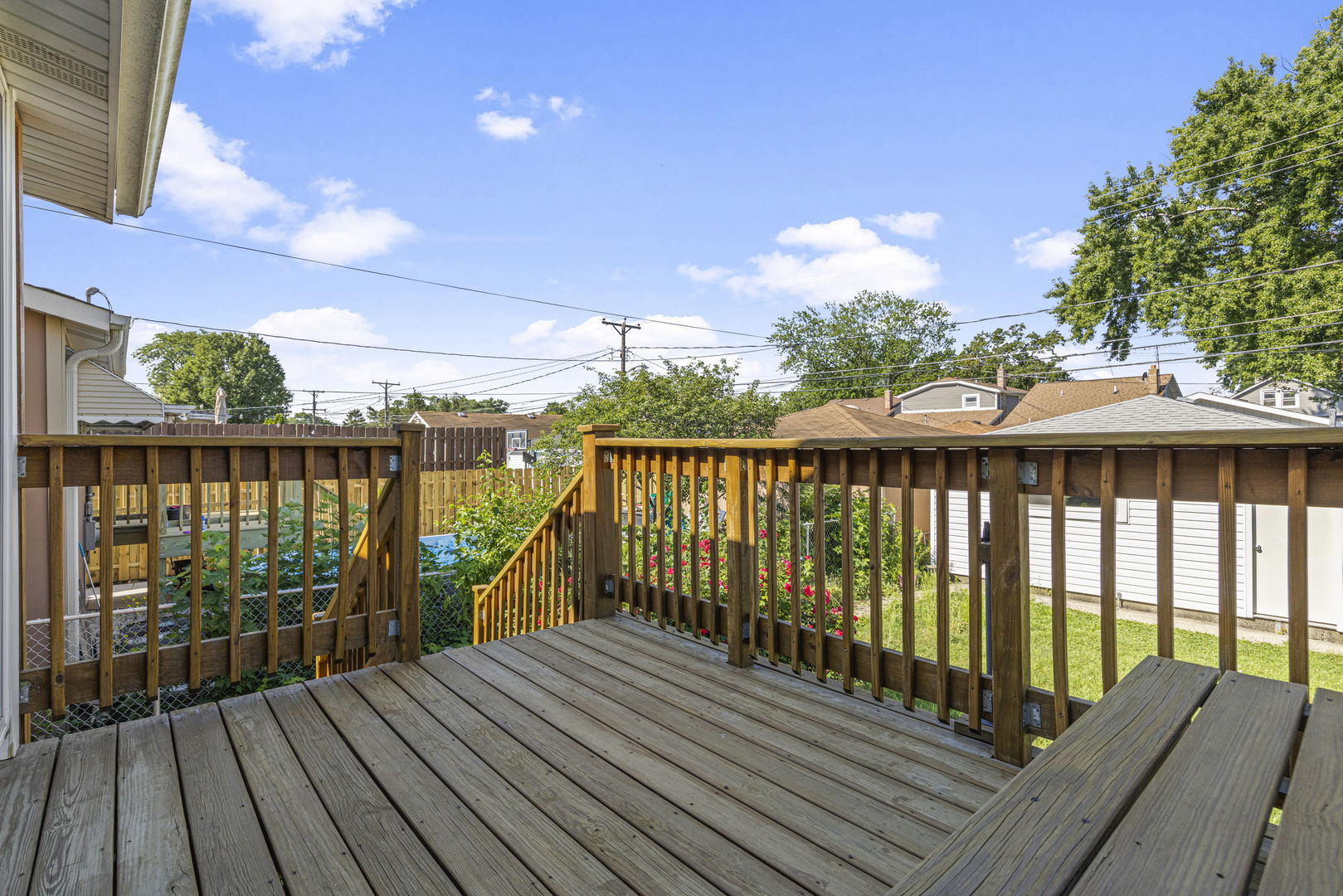 4236 North Ozark Avenue Norridge, IL 60706 - Photo 16 of 17 a balcony with wooden floor and outdoor space
