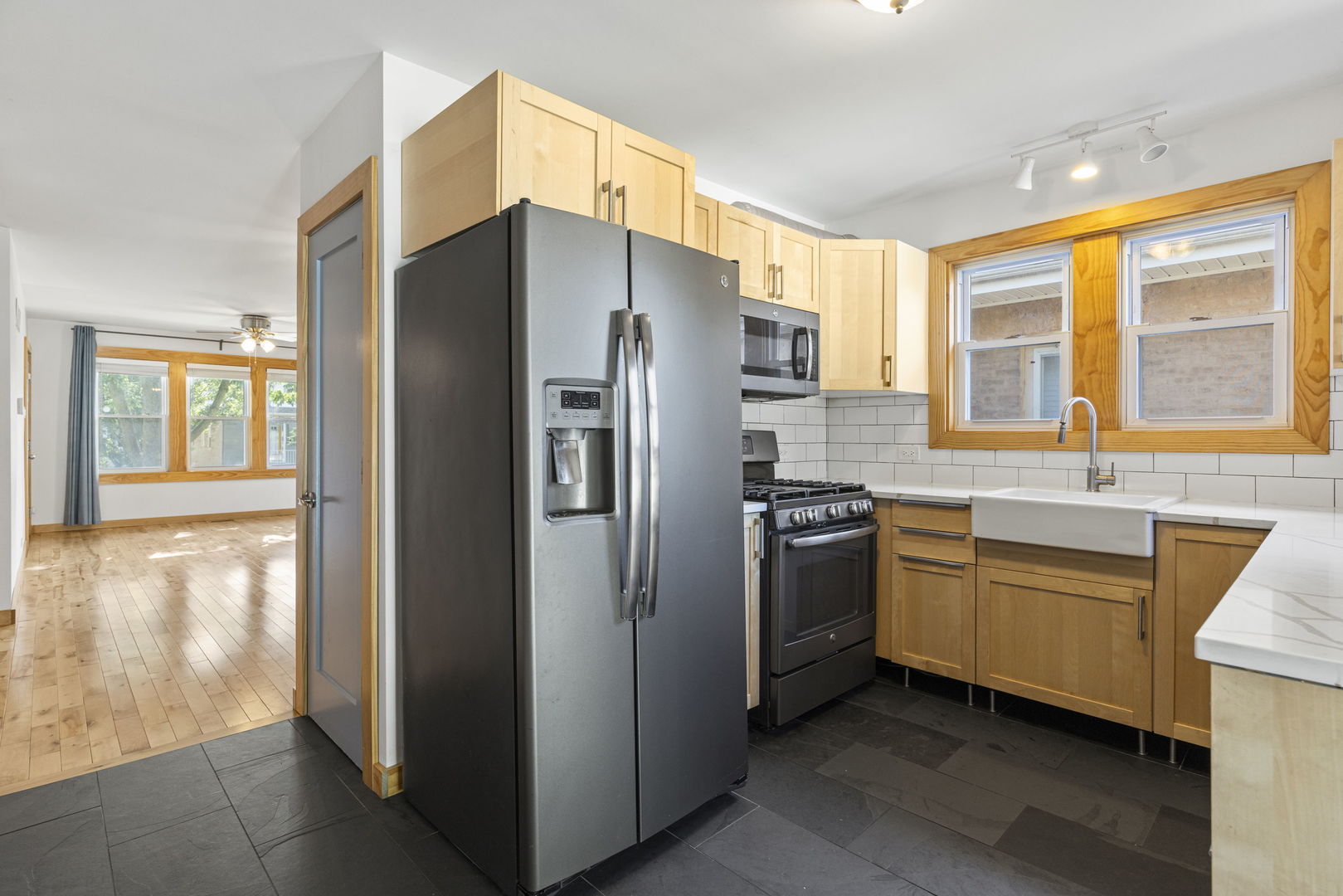 4236 North Ozark Avenue Norridge, IL 60706 - Photo 7 of 17 a kitchen with stainless steel appliances a refrigerator sink and cabinets