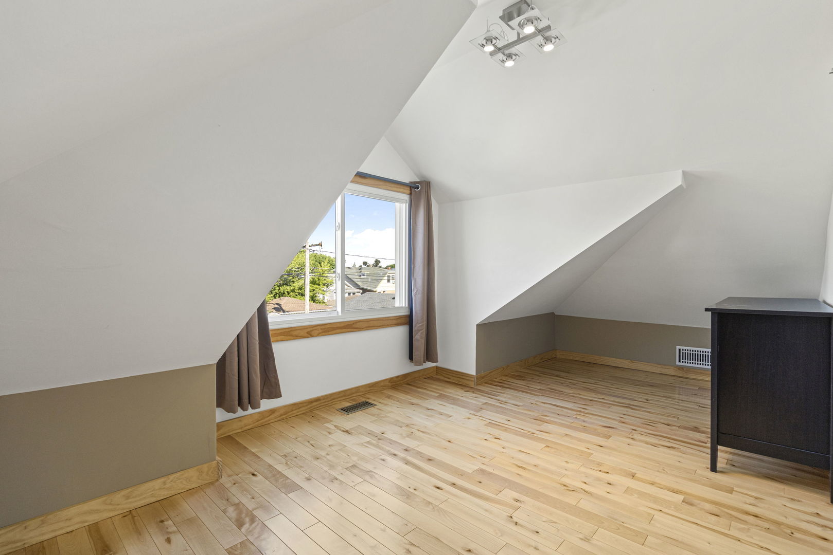 4236 North Ozark Avenue Norridge, IL 60706 - Photo 10 of 17 a view of an empty room and wooden floor