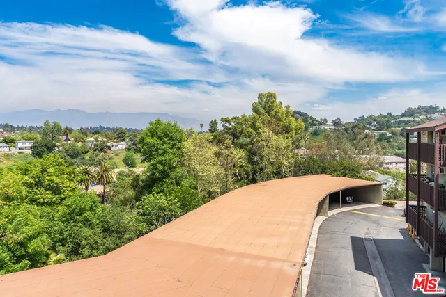 a terrace view with two chairs