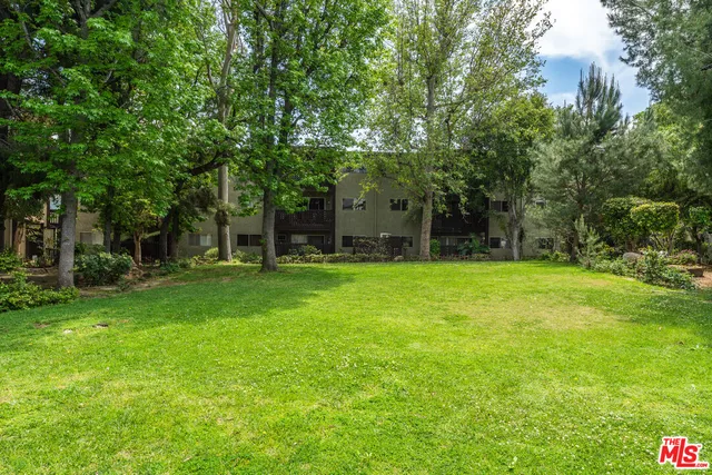 a garden view with a seating space