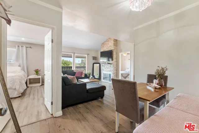 a living room with furniture and a table