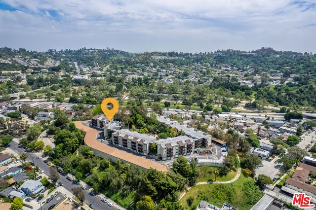 a view of a city with tall buildings