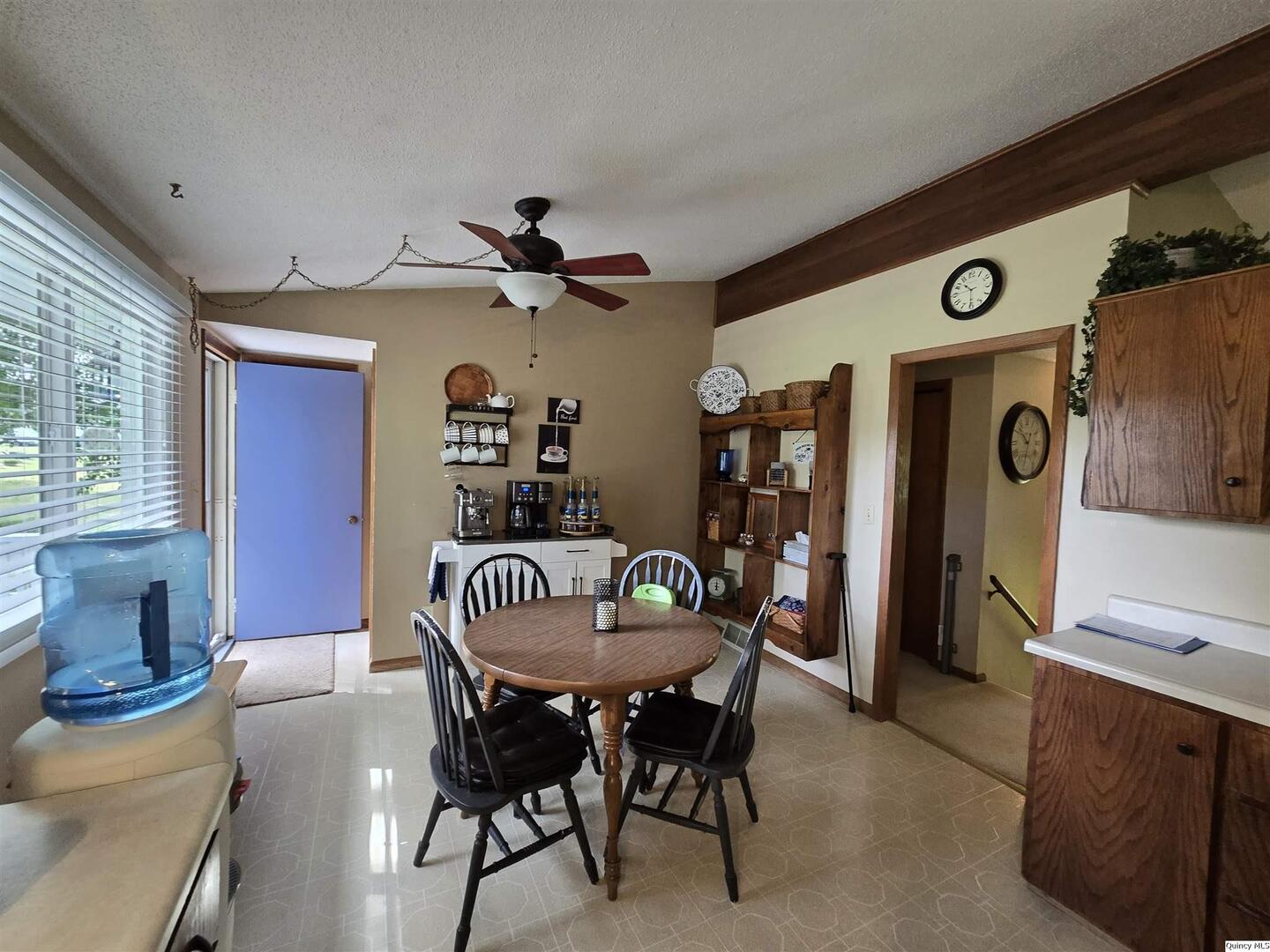 7955 Sugar Grove Road Rushville, IL 62681 - Photo 14 of 26 a dining room with furniture and window