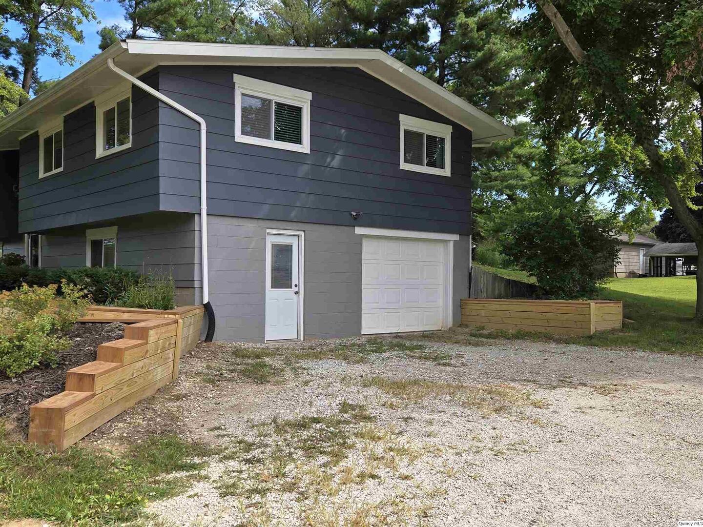 7955 Sugar Grove Road Rushville, IL 62681 - Photo 2 of 26 a view of a house with a yard