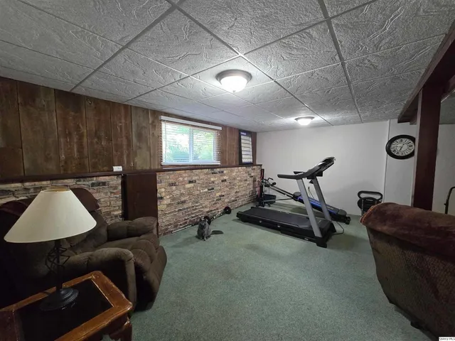 a livingroom with furniture and a window