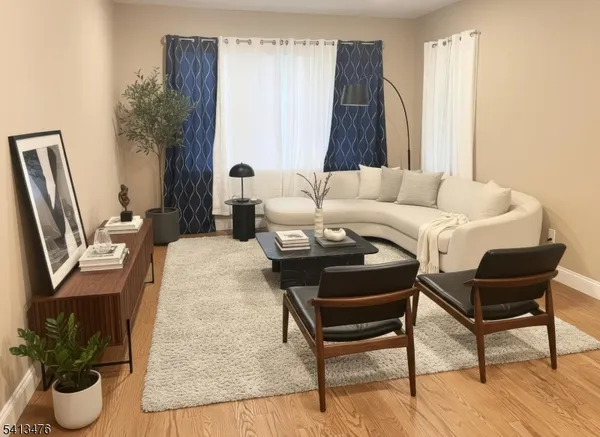 a bed room with a bed and a chair