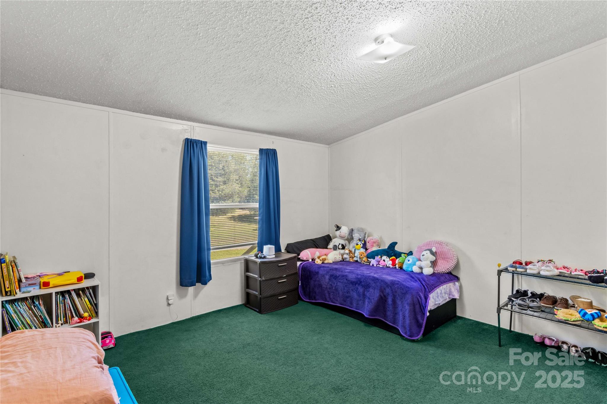 160 Ranchway Mocksville, NC 27028 - Photo 14 of 24 a bedroom with furniture and a window
