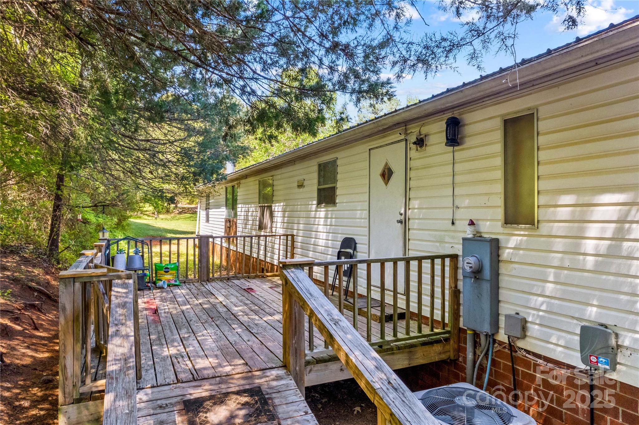 160 Ranchway Mocksville, NC 27028 - Photo 21 of 24 a view of a balcony with wooden floor and fence