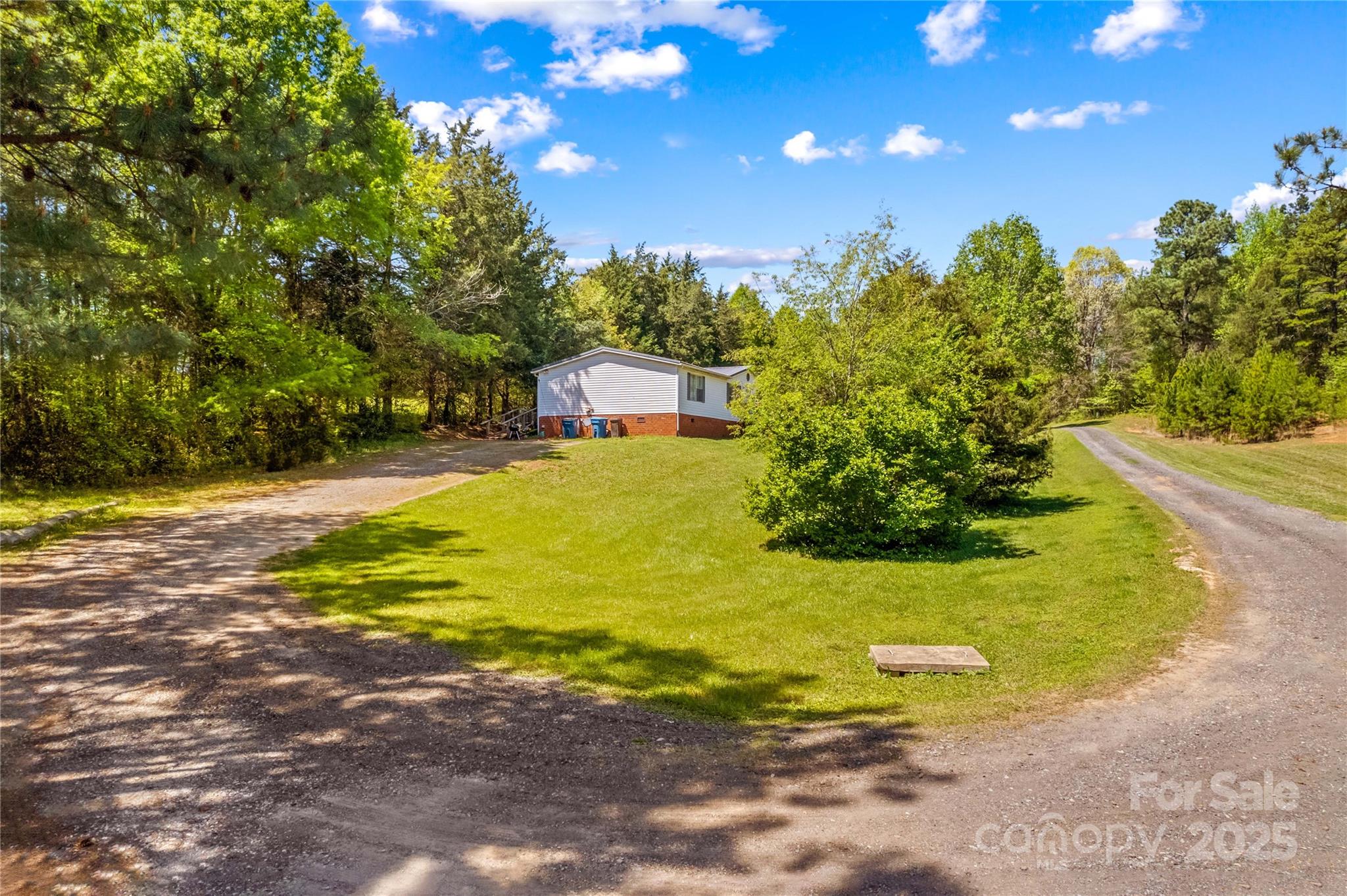 160 Ranchway Mocksville, NC 27028 - Photo 22 of 24 a view of a large swimming pool with an outdoor space and seating area