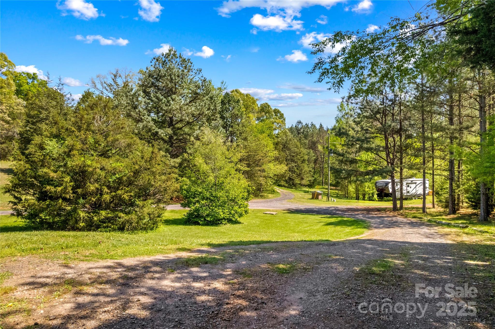 160 Ranchway Mocksville, NC 27028 - Photo 23 of 24 a view of a yard with a large trees