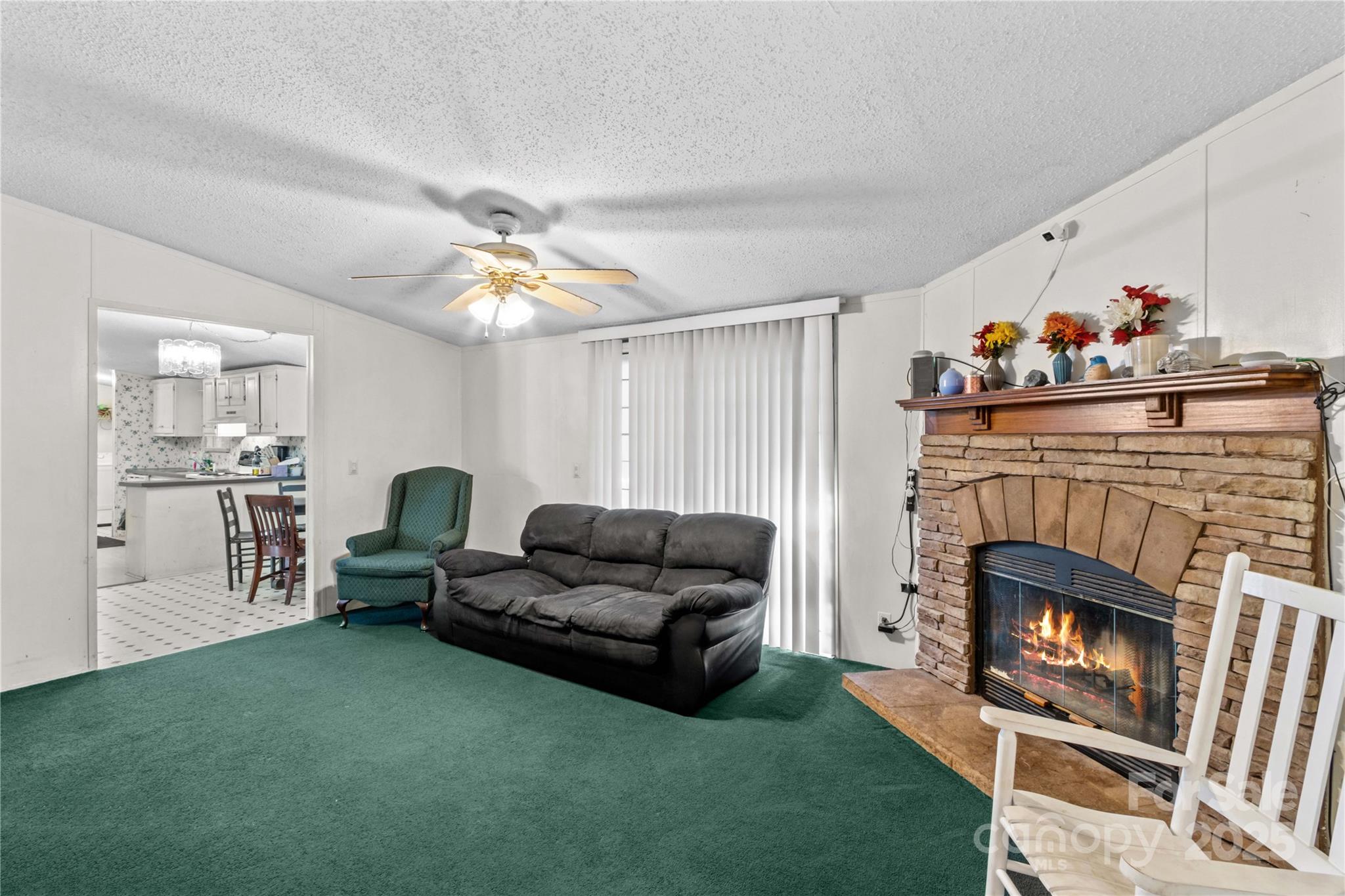 160 Ranchway Mocksville, NC 27028 - Photo 10 of 24 a living room with furniture and a fireplace