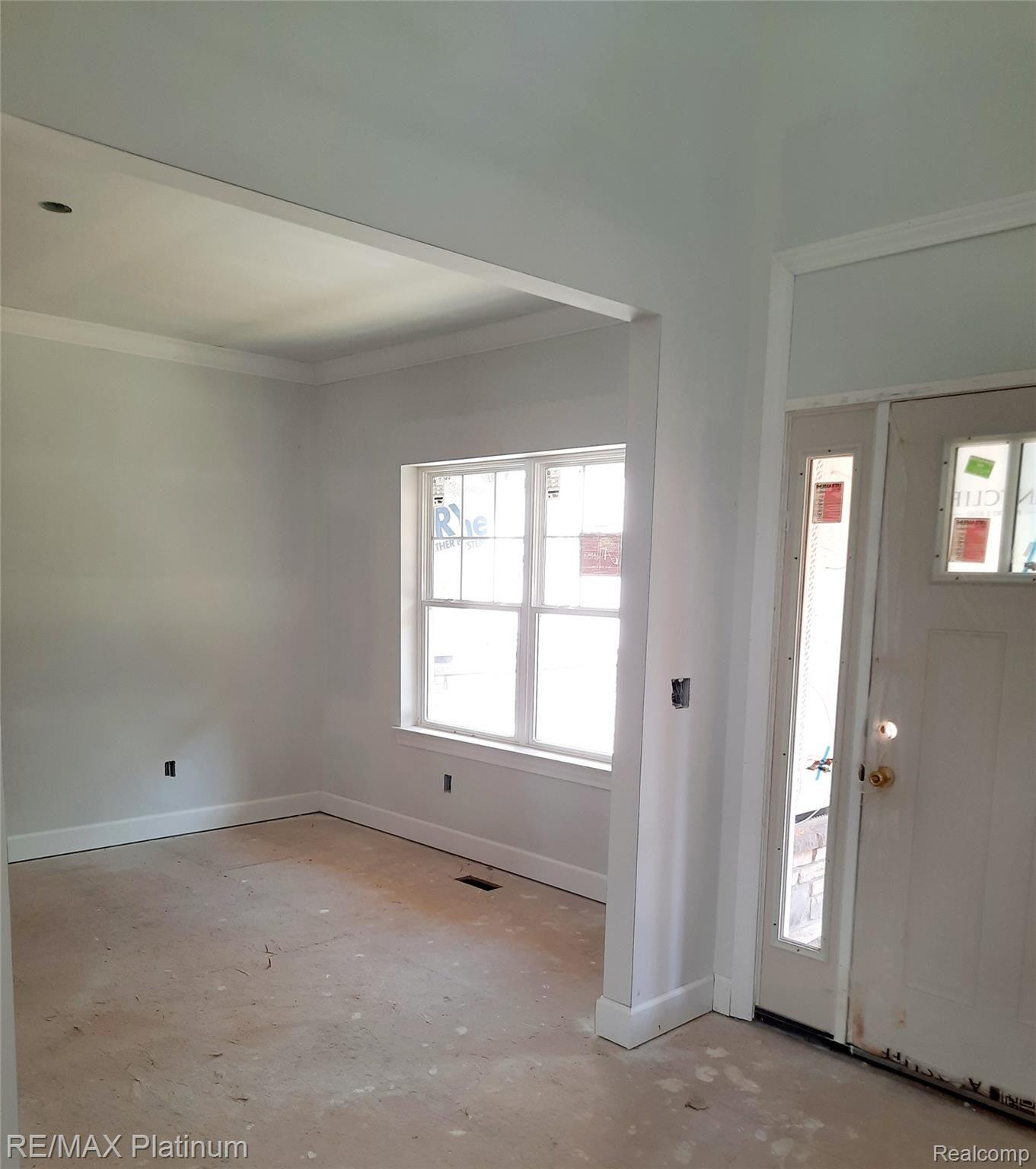 3901 North Latson Road Howell, MI 48855 - Photo 2 of 13 Foyer looking into formal dining space!