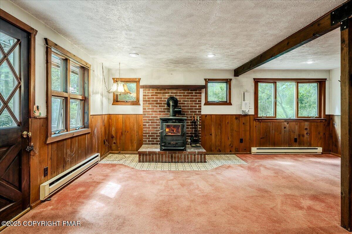 115 Dirk Road Tafton, PA 18464 - Photo 4 of 24 an empty room with furniture and windows