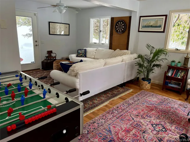 a bed room with furniture and a window