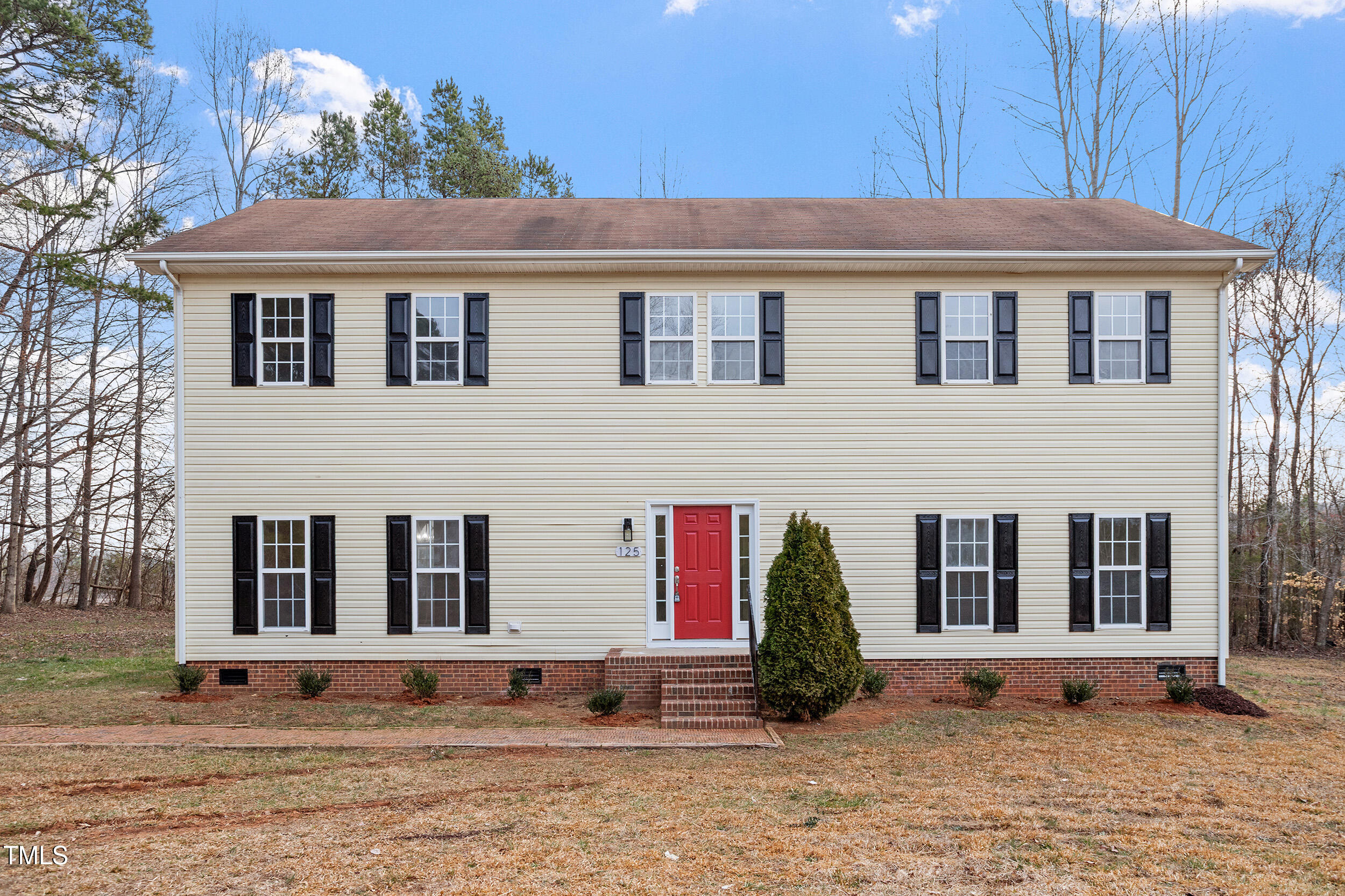 125 Vance Wrenn Road Roxboro, NC 27573 - Photo 2 of 39 a front view of house with yard