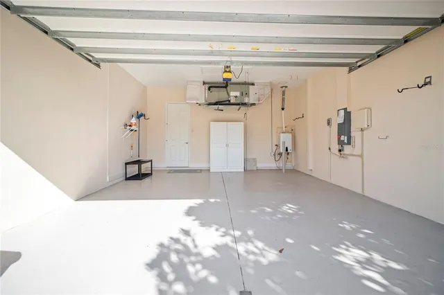 a backyard of a house with wooden floor and fence