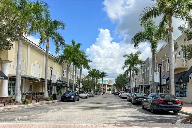 an aerial view of residential building and lake