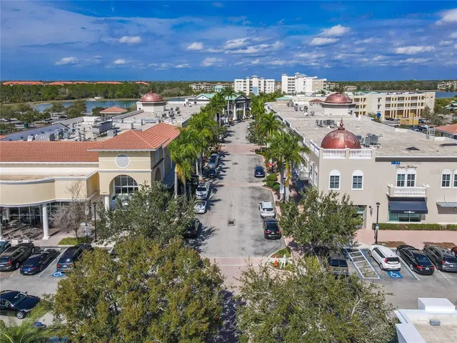 a view of a swimming pool with a yard