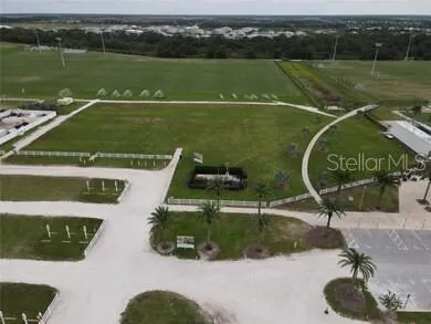 a view of outdoor space with a garden and signage