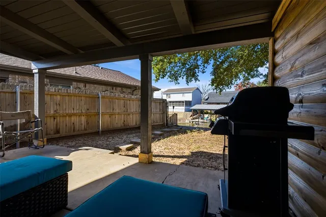 a view of a swimming pool with a lounge chairs
