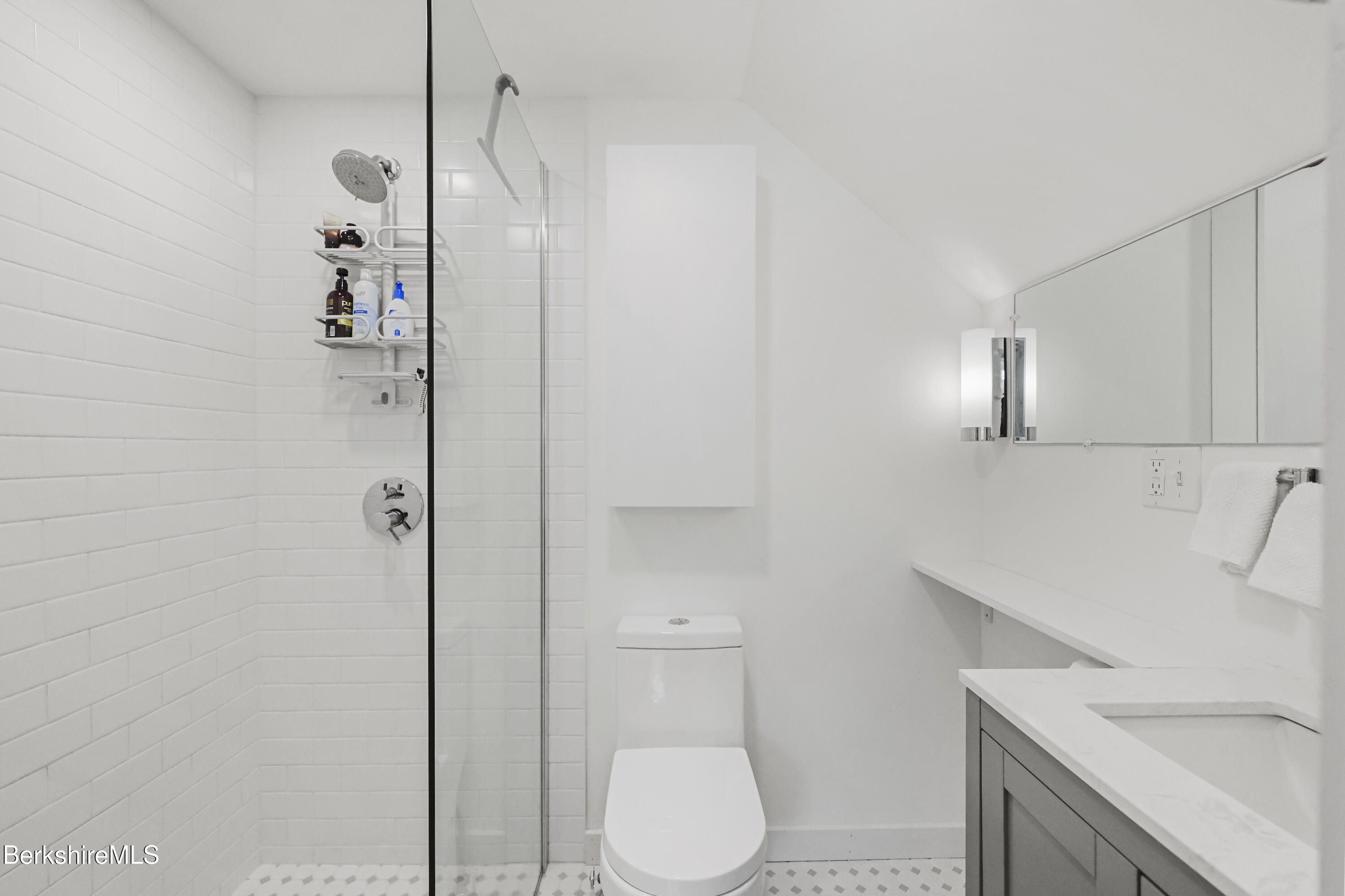 8 Lukeman Lane Stockbridge, MA 01229 - Photo 16 of 24 a bathroom with a sink a toilet and shower
