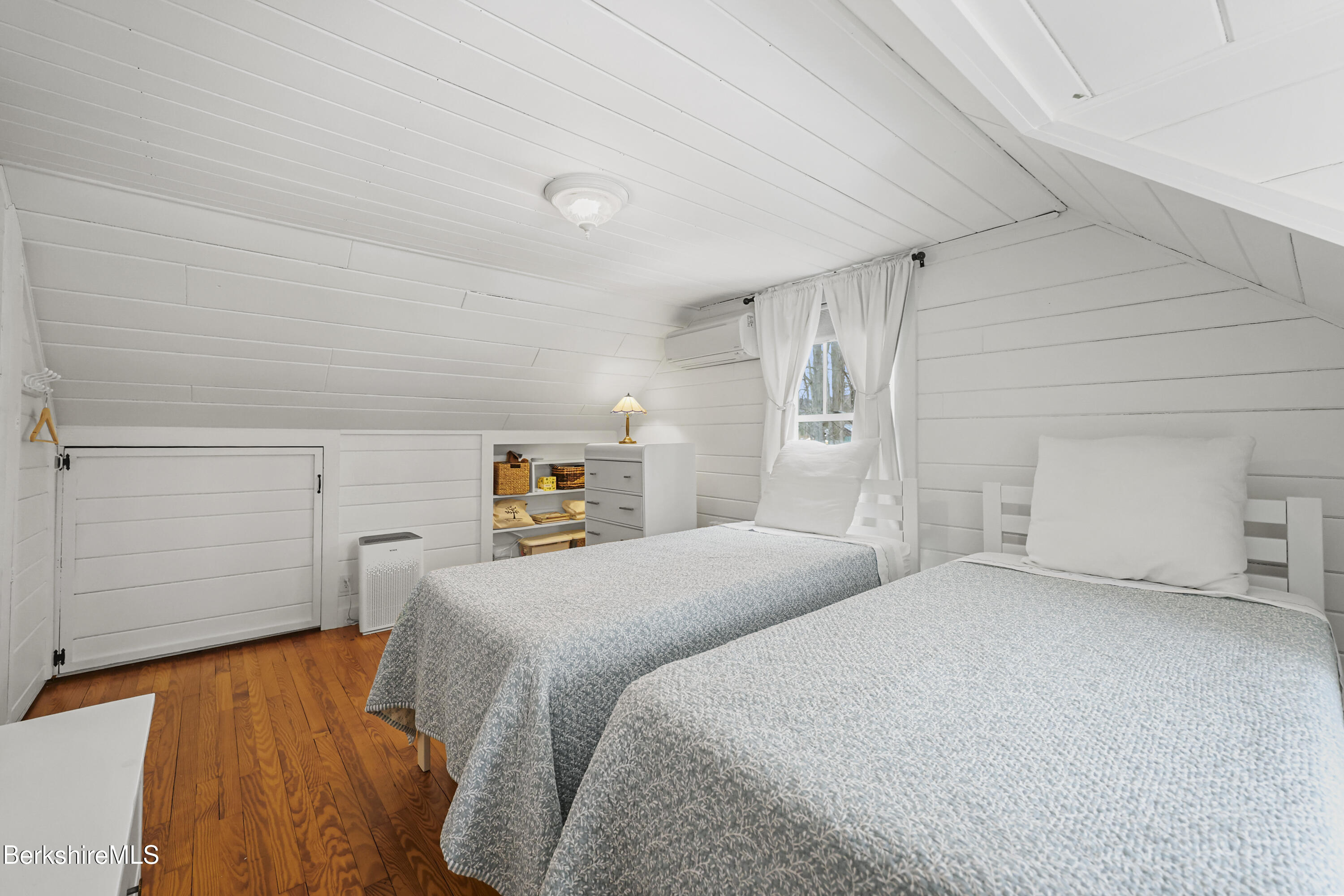 8 Lukeman Lane Stockbridge, MA 01229 - Photo 18 of 24 a bedroom with two beds and painted walls