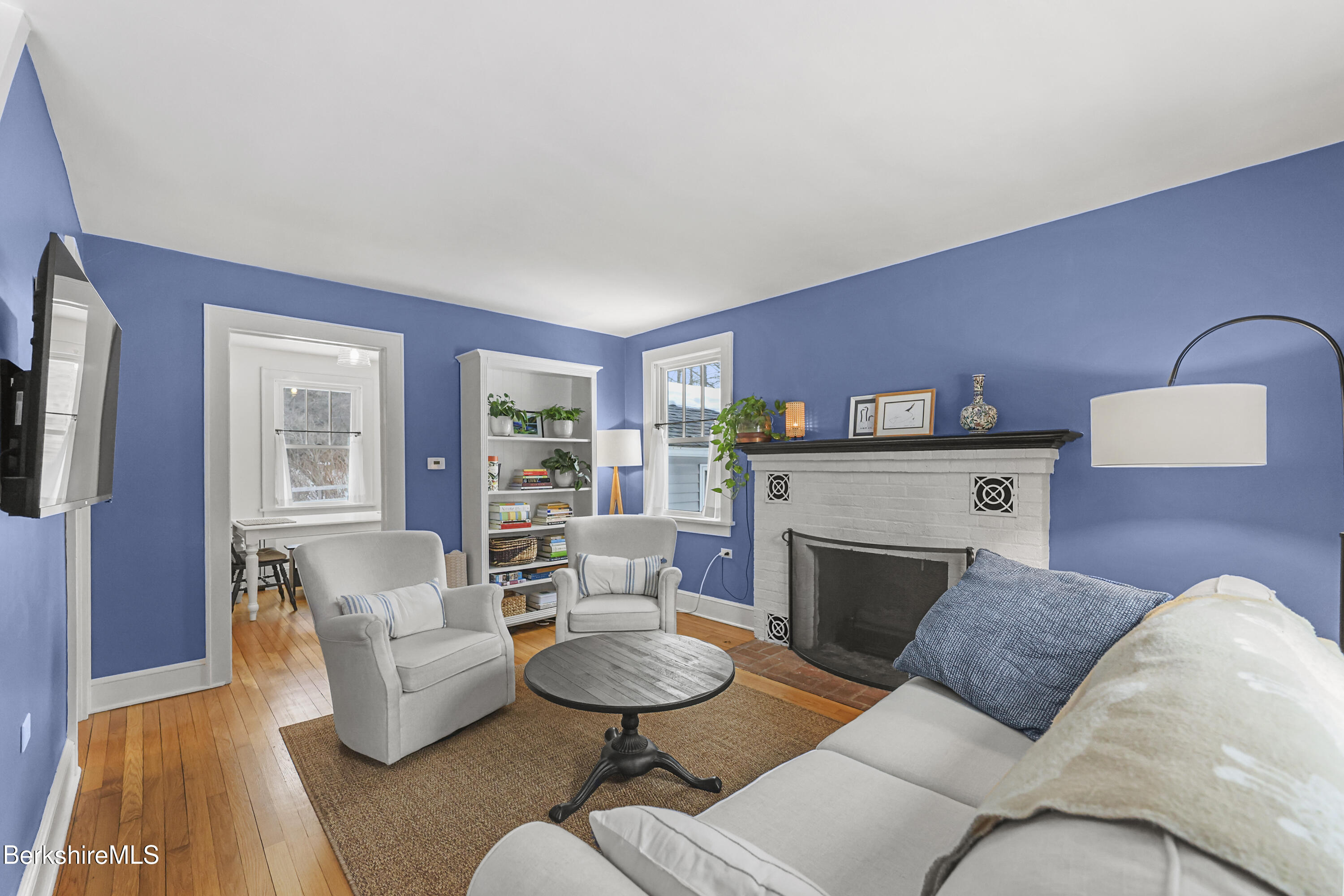 8 Lukeman Lane Stockbridge, MA 01229 - Photo 2 of 24 a living room with furniture and a fireplace