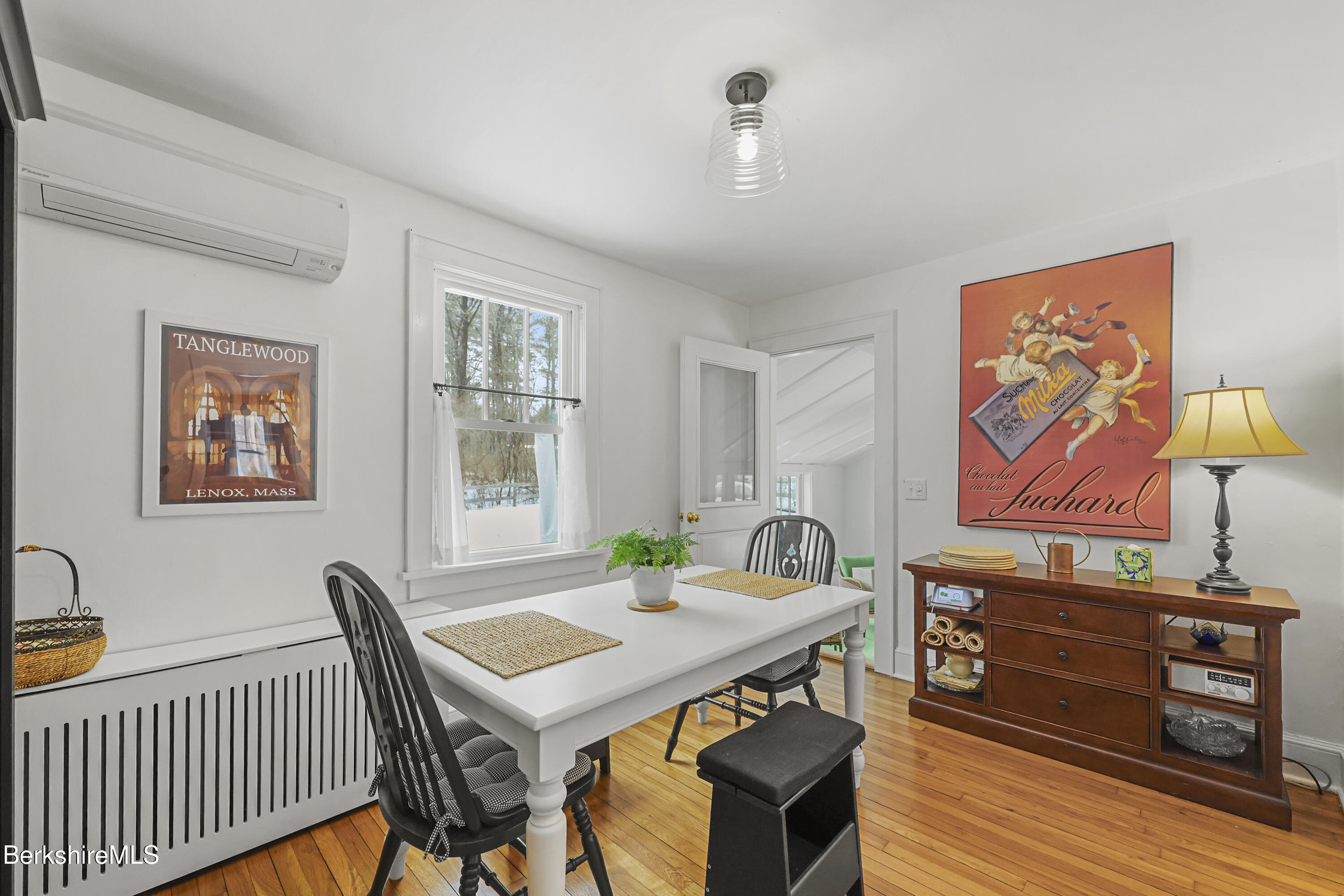 8 Lukeman Lane Stockbridge, MA 01229 - Photo 4 of 24 a view of a dining room with furniture window and wooden floor