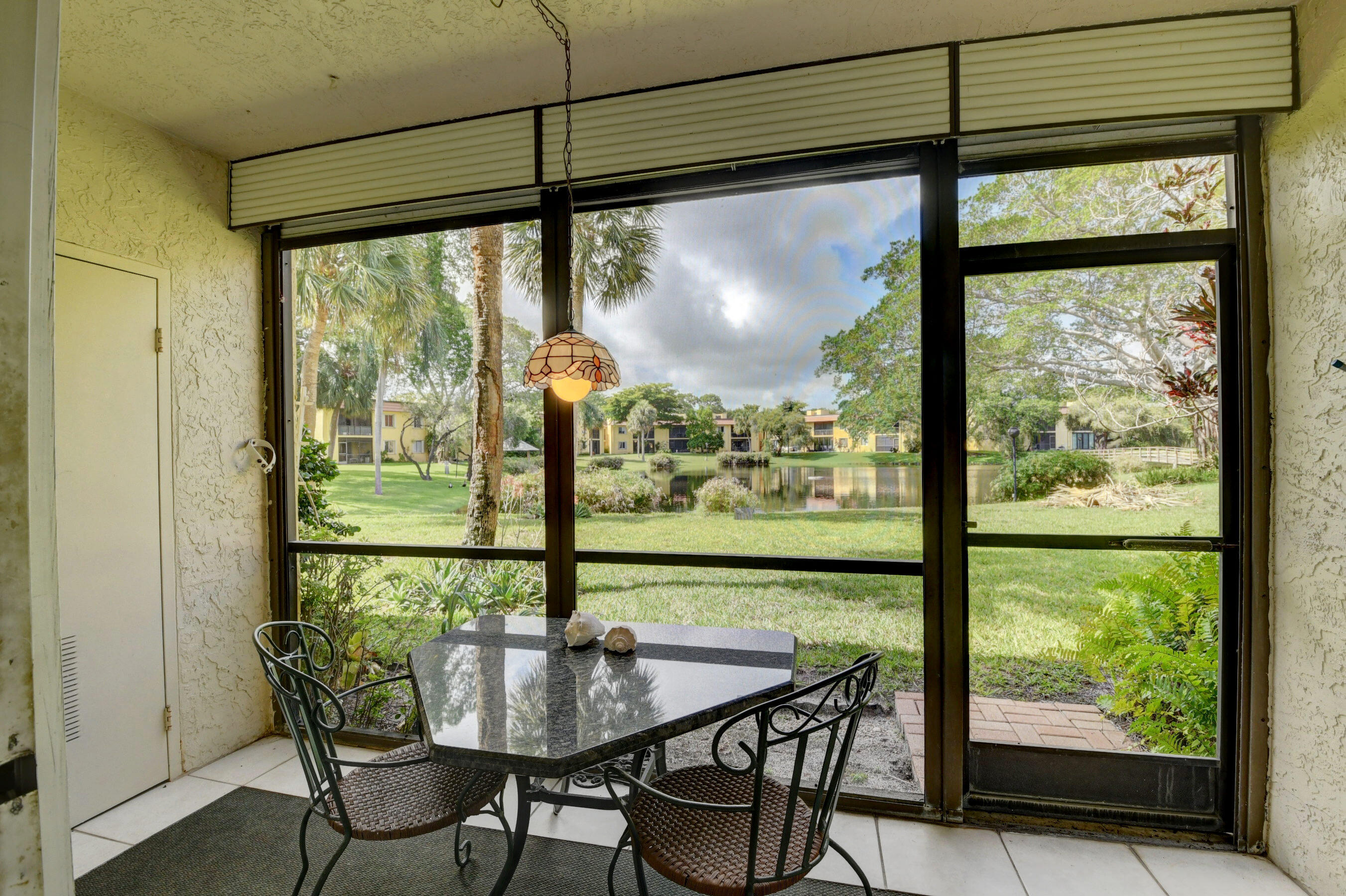 854 Southwest 9th St Circle, Unit 103 Boca Raton, FL 33486 - Photo 13 of 22 Screened Patio